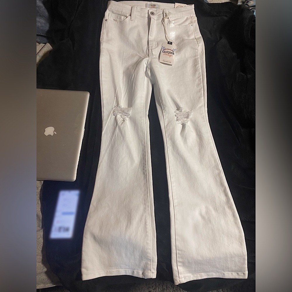 White bootcut ripped jeans